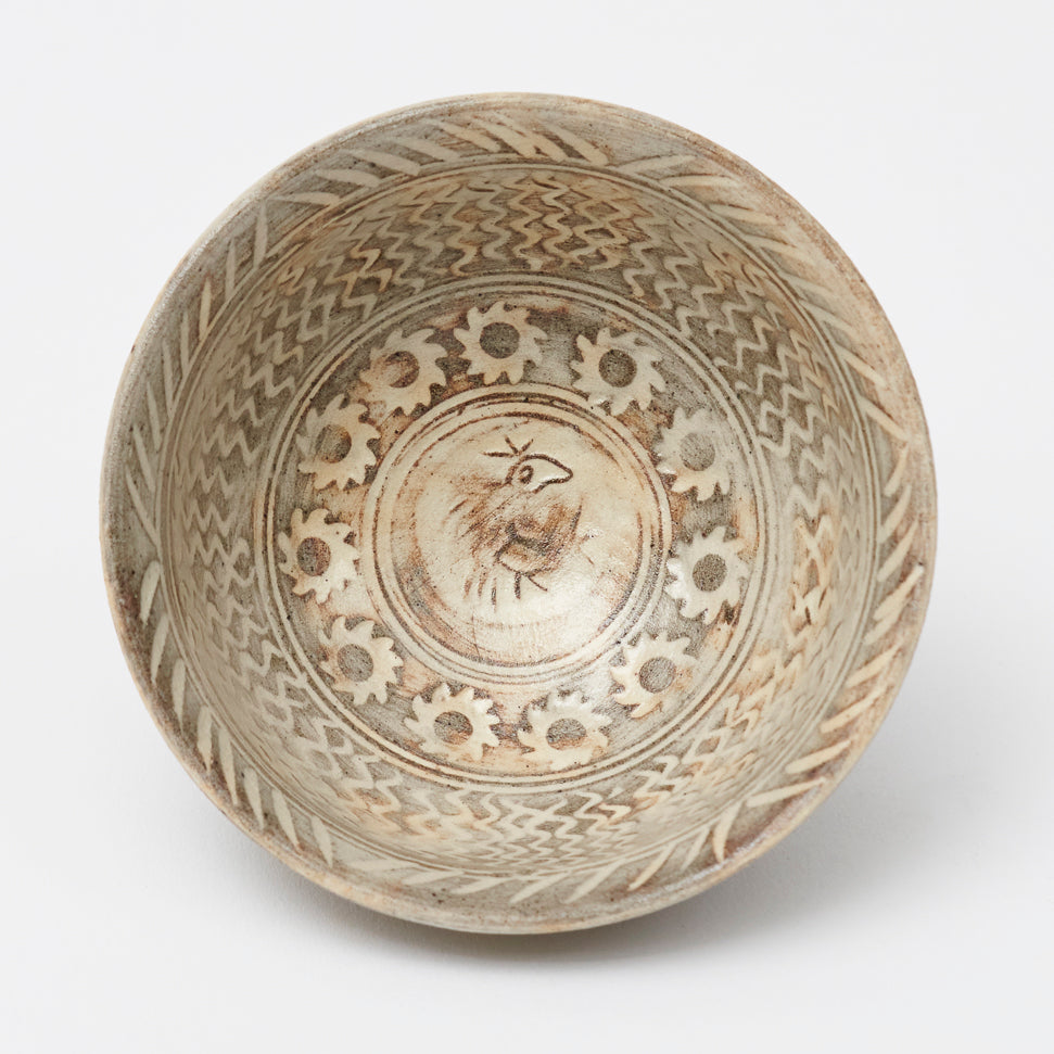 Buncheong cup with a flower pattern